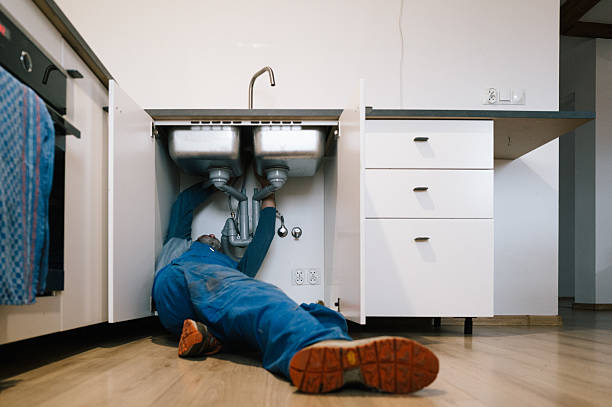 Professional Drain Cleaning technician working in Clayton, NC